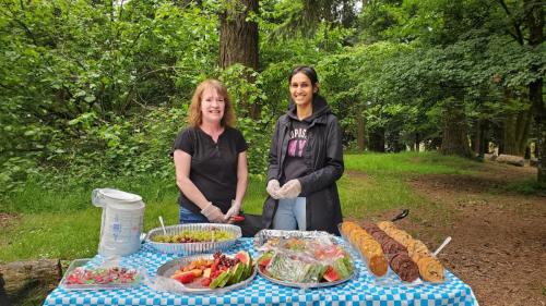 Attendees included Fraserside's employees, persons served, Board members, and other guests