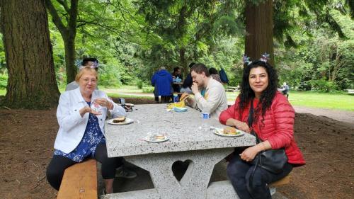 Attendees included Fraserside's employees, persons served, Board members, and other guests