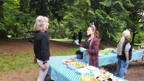 Attendees included Fraserside's employees, persons served, Board members, and other guests