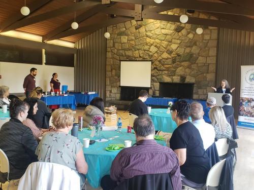 Elder Gertie Pierre from Indian Residential School Survivors Society (IRSSS) starts the training with an opening prayer of thanks and gratitude