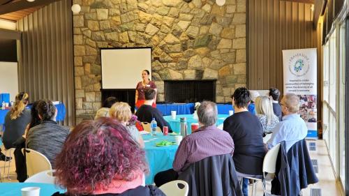 Inter-Generational Survivor and IRSSS presenter Chas Coultee starts her session with the Sacred Fire exercise